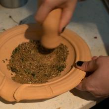 Grinding the spices